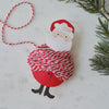 Ribbon - Red And White Christmas Ribbon around Santa Character